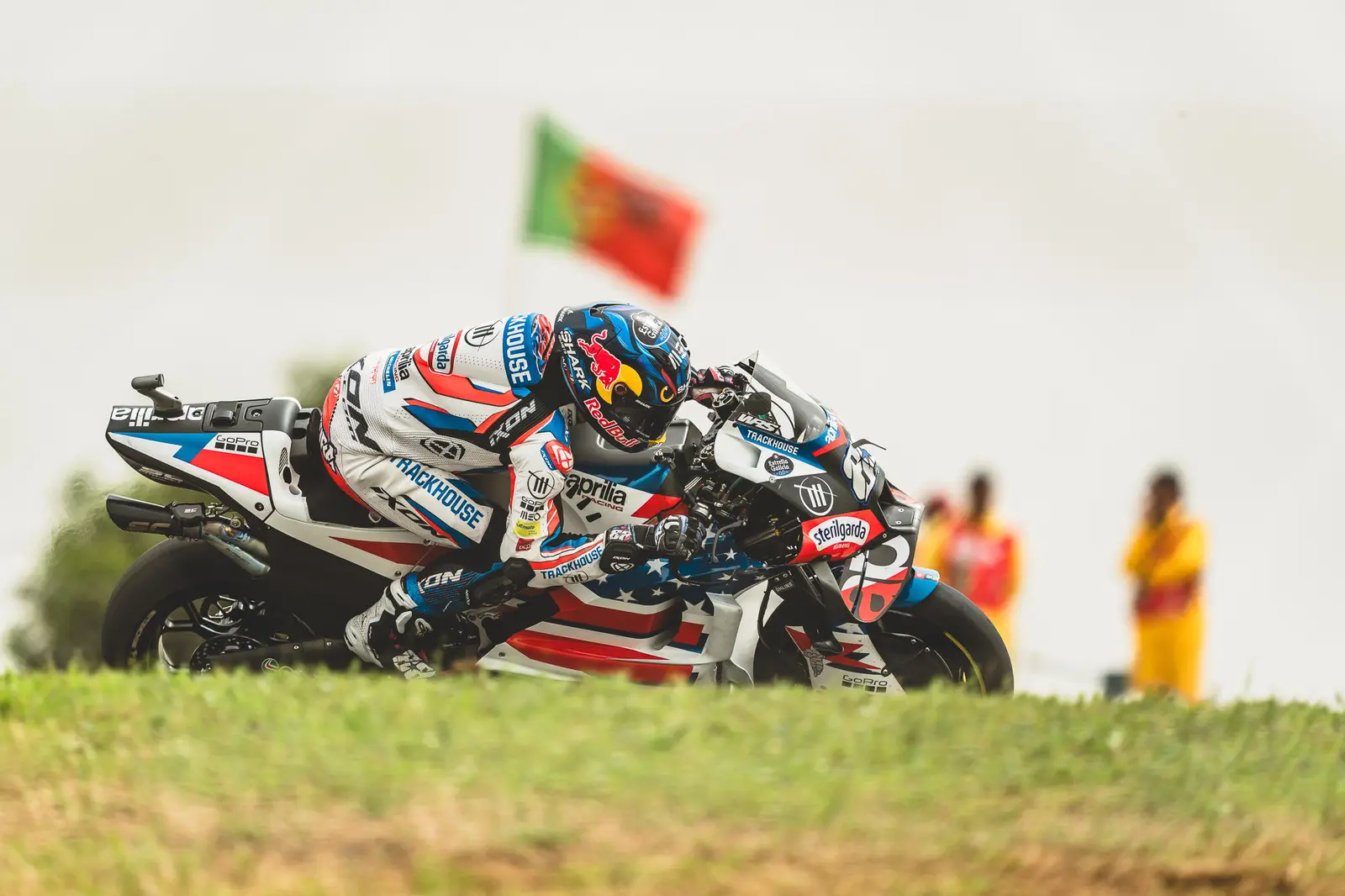 A MotoGP rider leaning through a corner