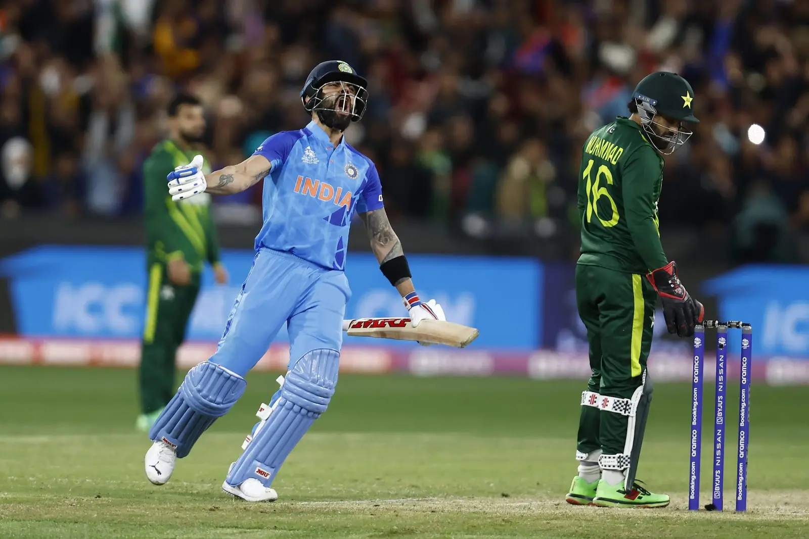 A batter driving the ball during an international match